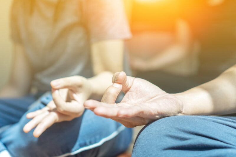 Meditate,Yoga,Hands,Of,Elderly,Woman,Doing,Meditation,In,Silhouette